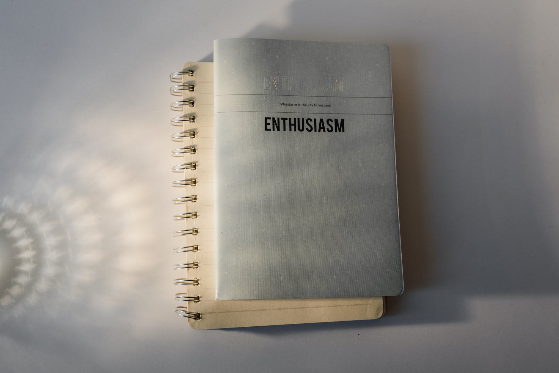 enthusiasm text on notepads cover
